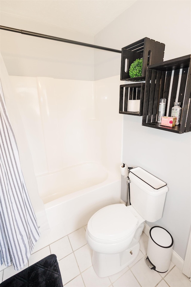 251 Pettigrew Rd, Milledgeville, GA 31061 - full bathroom with tile patterned floors, toilet, baseboards, and shower / bathtub combination
