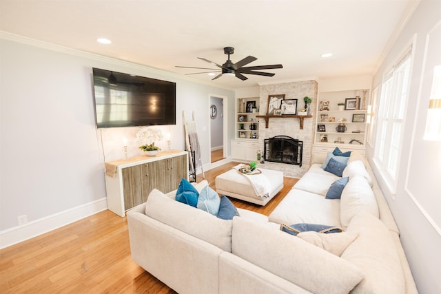 251 Pettigrew Rd, Milledgeville, GA 31061 - living area featuring baseboards, ceiling fan, light wood-style flooring, and crown molding