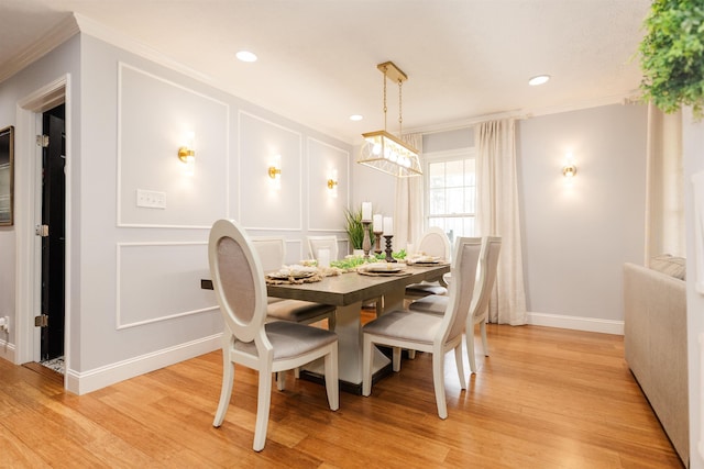 251 Pettigrew Rd, Milledgeville, GA 31061 - dining area with a notable chandelier, crown molding, light wood-type flooring, a decorative wall, and recessed lighting
