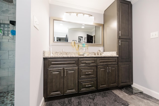 251 Pettigrew Rd, Milledgeville, GA 31061 - full bathroom with marble finish floor, baseboards, crown molding, and vanity