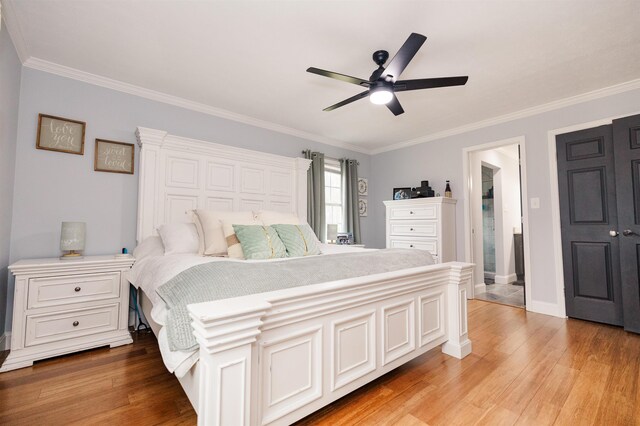 251 Pettigrew Rd, Milledgeville, GA 31061 - bedroom featuring baseboards, ornamental molding, ceiling fan, and light wood-type flooring