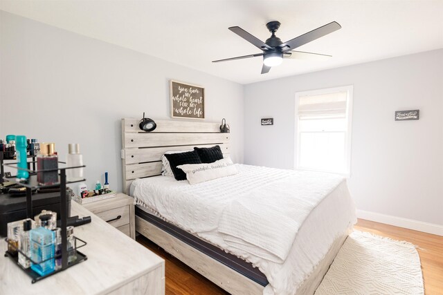 251 Pettigrew Rd, Milledgeville, GA 31061 - bedroom with light wood finished floors, baseboards, and ceiling fan