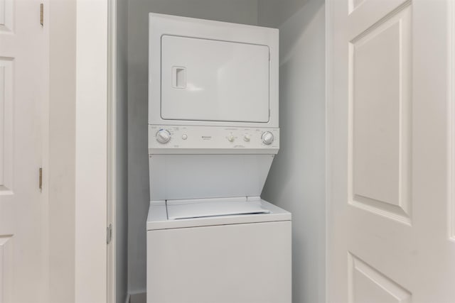 1101 Maple Ridge Way, Greensboro, GA 30642 - laundry area with laundry area and stacked washer / dryer