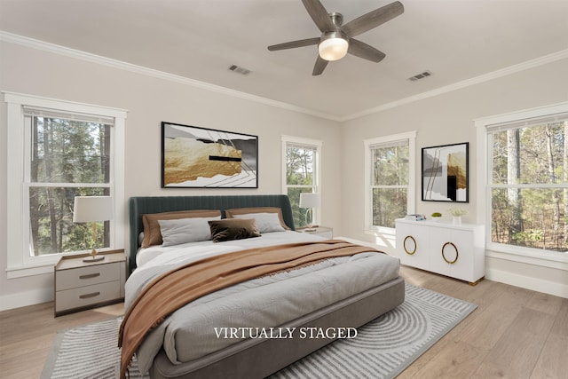 1101 Maple Ridge Way, Greensboro, GA 30642 - bedroom featuring visible vents, ornamental molding, and multiple windows