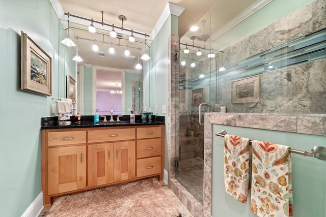 bathroom featuring crown molding, vanity, and a shower with door