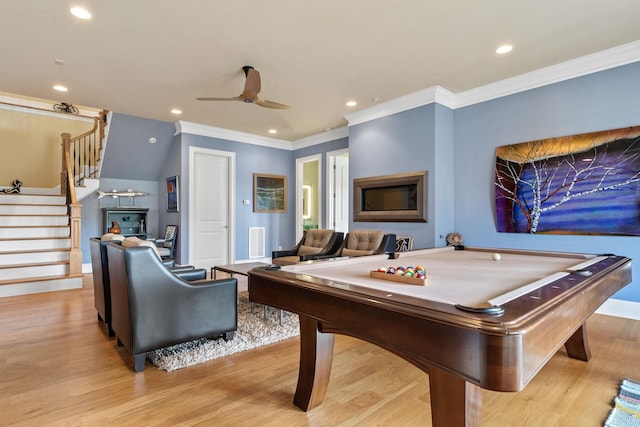 playroom featuring pool table, crown molding, light hardwood / wood-style floors, and ceiling fan