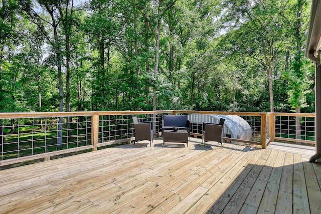 222 River Bend Dr, Eatonton, GA 31024 - wooden deck with an outdoor living space