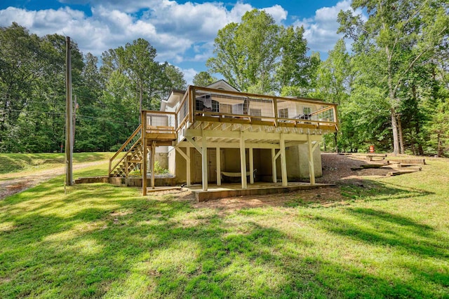 222 River Bend Dr, Eatonton, GA 31024 - back of property with a wooden deck, a yard, and stairs