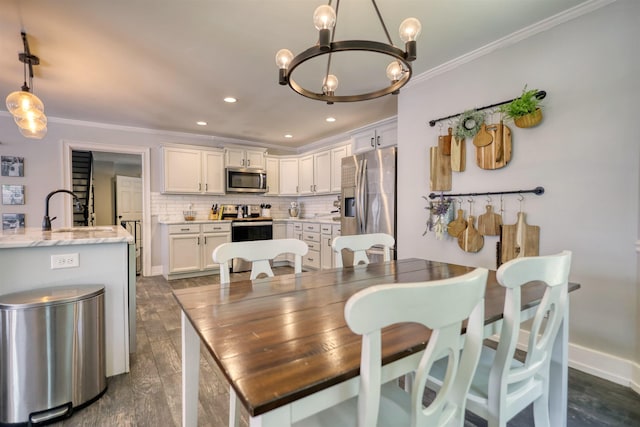 222 River Bend Dr, Eatonton, GA 31024 - dining room featuring crown molding, a chandelier, and recessed lighting