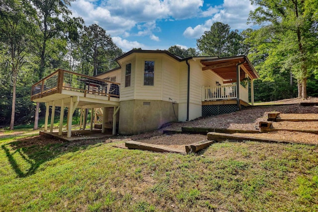 222 River Bend Dr, Eatonton, GA 31024 - back of property featuring a deck and a yard