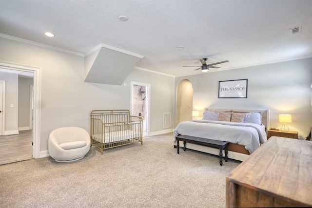 222 River Bend Dr, Eatonton, GA 31024 - bedroom featuring ornamental molding, carpet floors, arched walkways, a ceiling fan, and recessed lighting