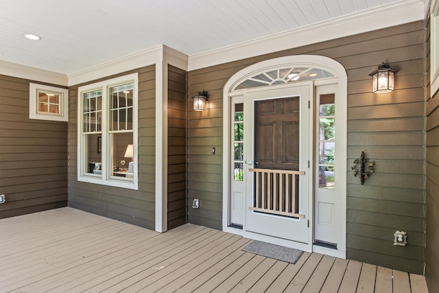 doorway to property with covered porch