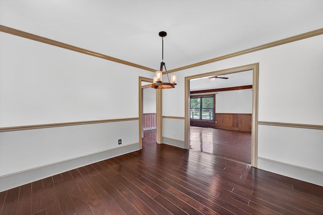 128 Turtle Ct, Eatonton, GA 31024 - empty room featuring wainscoting, crown molding, wood finished floors, and a chandelier
