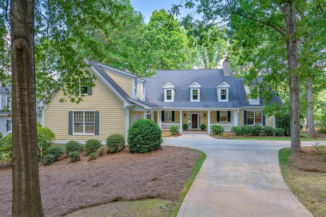 cape cod home with covered porch