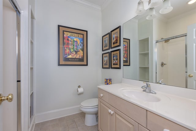 bathroom featuring crown molding, vanity, tile patterned floors, toilet, and walk in shower