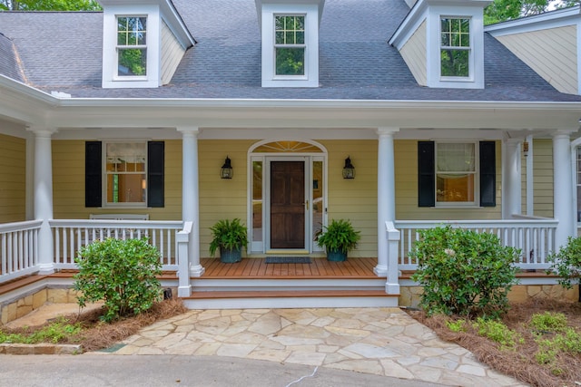 entrance to property with a porch