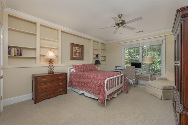 carpeted bedroom featuring ceiling fan and ornamental molding