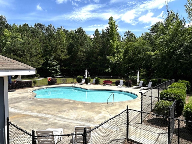  - community pool with a patio