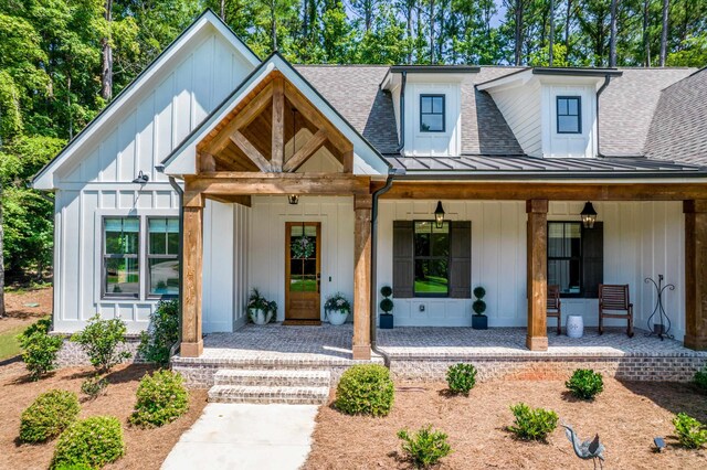 modern inspired farmhouse with covered porch