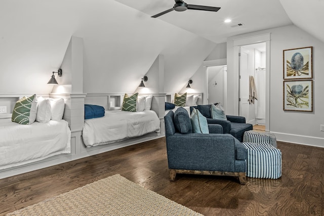 bedroom with a ceiling fan, vaulted ceiling, wood finished floors, and visible vents
