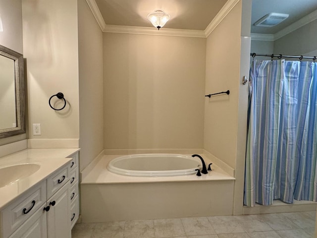 bathroom featuring visible vents, vanity, crown molding, and a garden tub