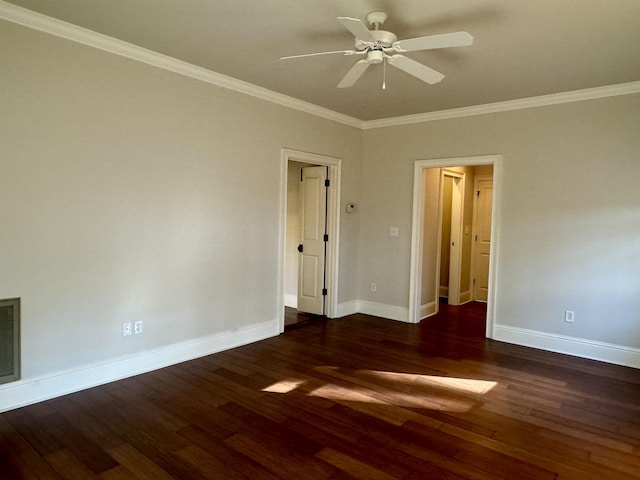 spare room with ornamental molding, ceiling fan, baseboards, and wood finished floors