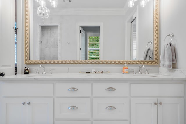 bathroom with walk in shower, ornamental molding, and vanity