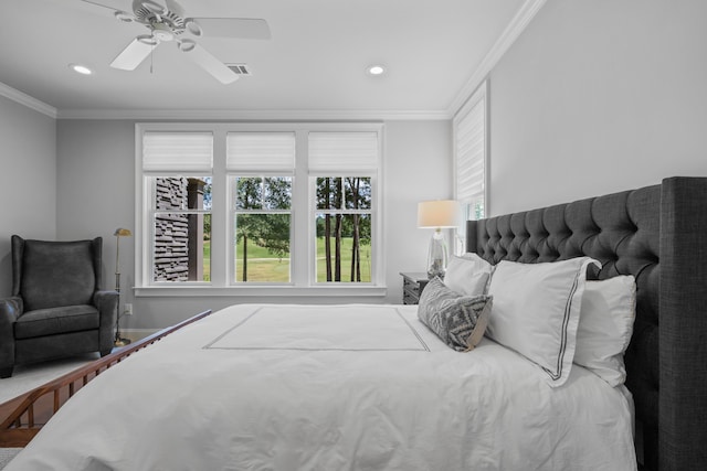 bedroom featuring crown molding and ceiling fan