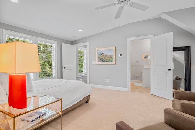 carpeted bedroom with ceiling fan and lofted ceiling