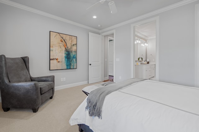 carpeted bedroom with ceiling fan, ornamental molding, and ensuite bathroom