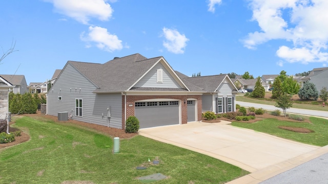 traditional-style house featuring central AC unit, driveway, brick siding, an attached garage, and a front lawn