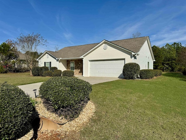 single story home with a garage and a front lawn