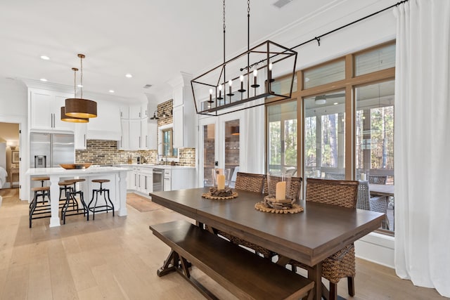 dining area featuring recessed lighting, visible vents, and light wood-style floors