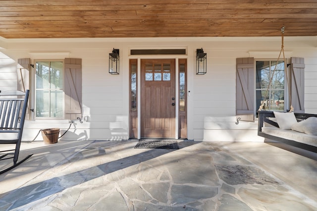 property entrance with a porch