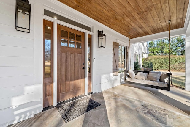 property entrance with a porch