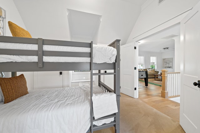 bedroom with light wood finished floors