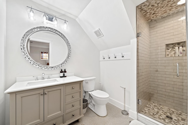 bathroom with visible vents, lofted ceiling, toilet, and a stall shower