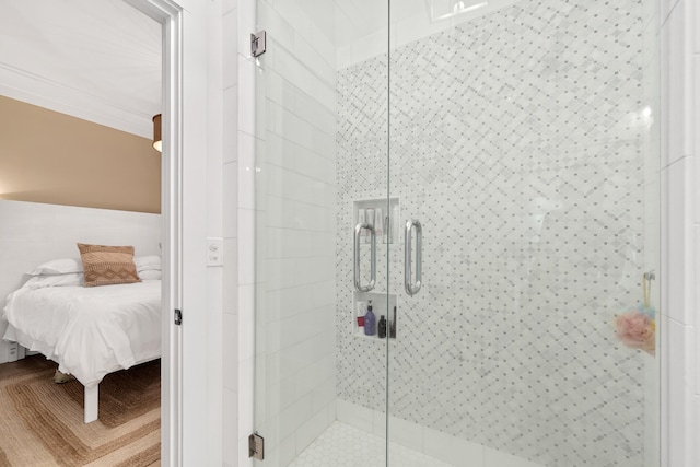 full bathroom featuring tile walls, a stall shower, ensuite bath, and crown molding