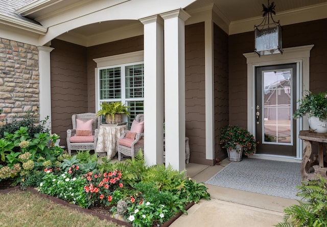 doorway to property with covered porch