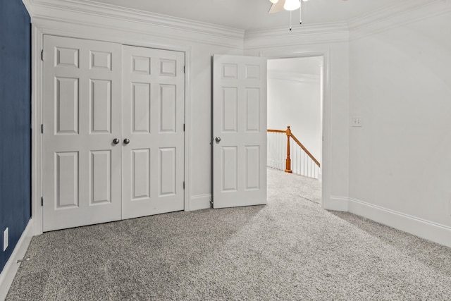 775 Markhams Dr, Madison, GA 30650 - unfurnished bedroom featuring baseboards, crown molding, a closet, and carpet flooring
