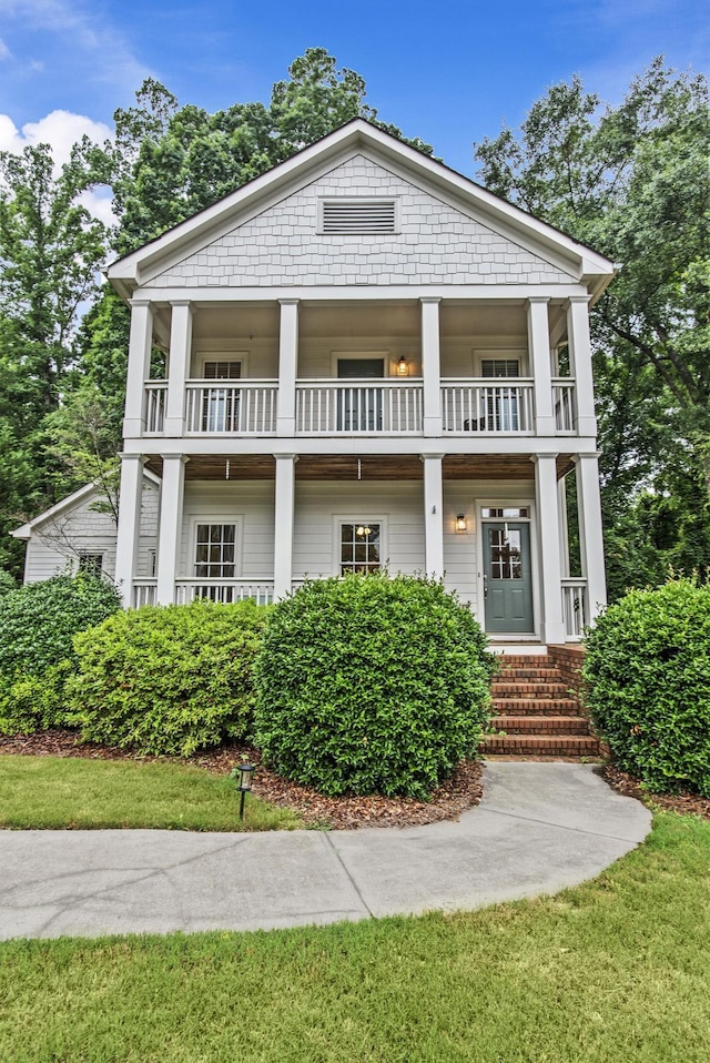 775 Markhams Dr, Madison, GA 30650 - neoclassical home with a balcony and a porch
