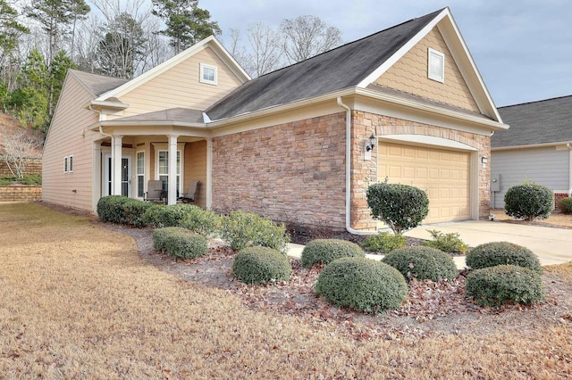 view of front facade featuring a garage and a porch