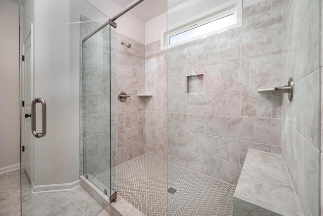 bathroom with an enclosed shower