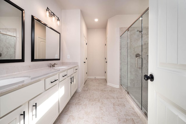 bathroom with vanity and an enclosed shower