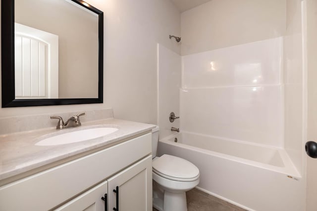 full bathroom featuring bathtub / shower combination, vanity, toilet, and tile patterned flooring