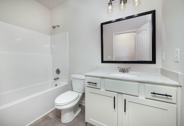 full bathroom featuring vanity, tile patterned flooring, toilet, and washtub / shower combination