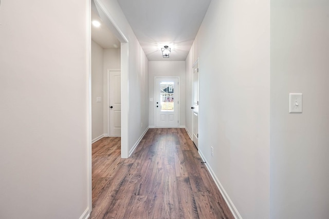 doorway featuring wood-type flooring