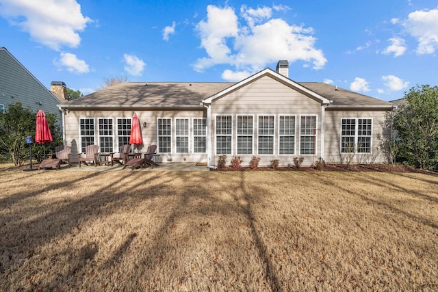 1080 Water Front Rd, Greensboro, GA 30642 - rear view of house featuring a patio, a yard, and a chimney