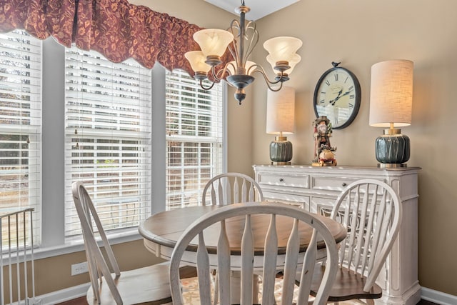 1080 Water Front Rd, Greensboro, GA 30642 - dining room featuring baseboards and a chandelier