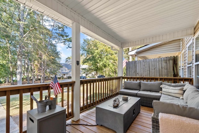 deck featuring outdoor lounge area